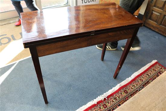 A George III mahogany tea table W.85cm